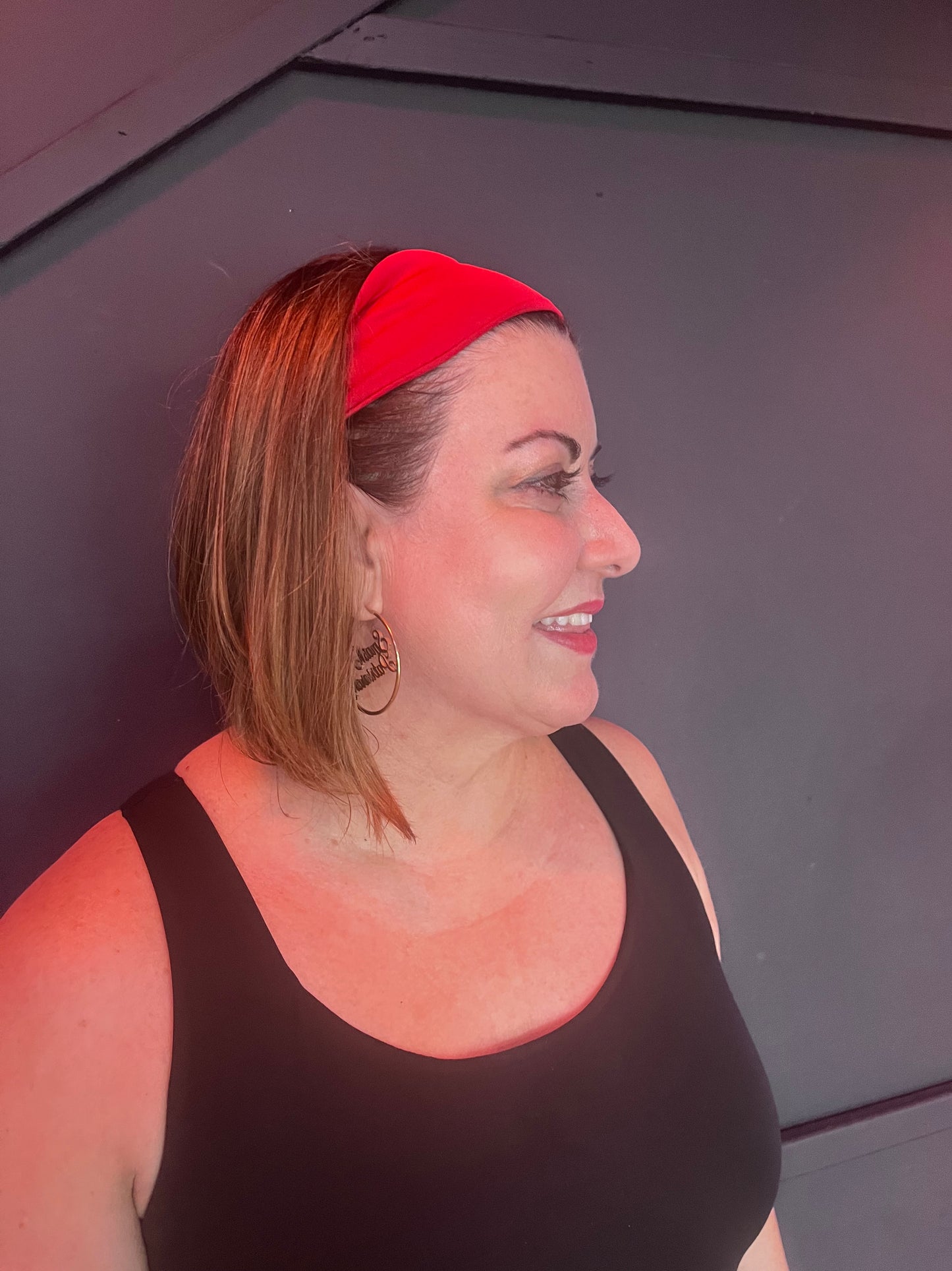 Side view of Scarlet Red Laze Headband showing soft stretch fit and vibrant color